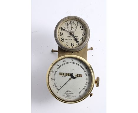 Two dashboard instruments mounted together,comprising Stewart Speedometer, model number 11, numbered 0130384, 3 1/3 inch beze