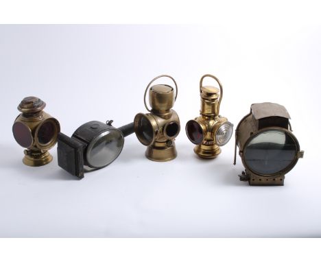 Five assorted lamps,including Lucas 'King of the Road' backlight No 636; an Adams & Westlake Company 'X-Rays' auto tail lamp;