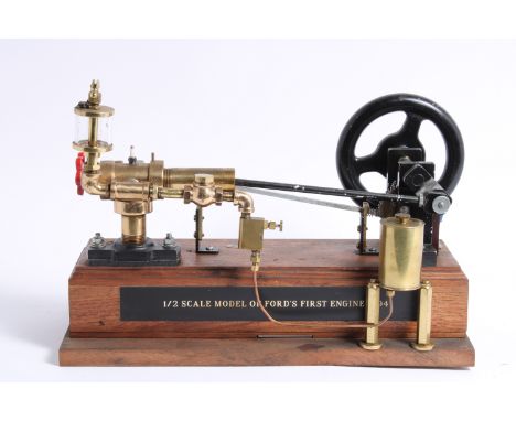 A 1:2 scale working model of Ford's First engine 1894,mounted on a wooden base, (condition untested). Lot to be sold without 