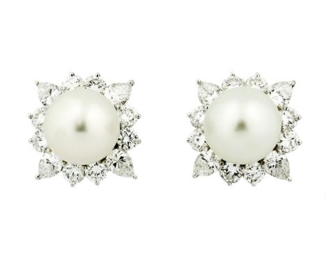 PLATINUM AND 18KT PEARL AND DIAMOND EARRINGS Pair of Platinum and 18kt White Gold,  Cultured Pearl and Diamond Earrings Cente