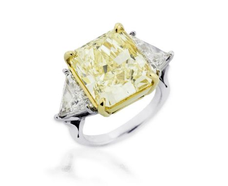 PLATINUM, 18 KARAT GOLD FANCY LIGHT YELLOW DIAMOND RING Platinum, 18 Karat Gold Fancy Light Yellow Diamond and Diamond Ring C