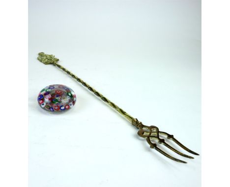 A multi-cane paperweight, 19th century, the low crown centred by a pink flower head and two circles of multicoloured canes, s