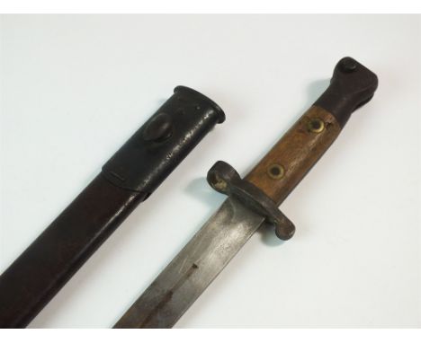 A British 1888 Lee Metford bayonet and scabbard, blade length 30cm, overall length 42cm