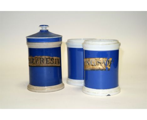 A small 19th century apothecary collection to include three ceramic storage jars, one with lid, two with original content lab