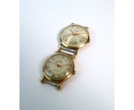 Two (2) 9ct Trebex wristwatches, one with sector dial and pointer hour hand with arabic gilt numerals, paired with elliptical