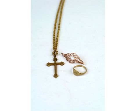 A yellow metal crucifix pendant, stamped '9ct', suspended from decorative yellow metal chain, not stamped, together with a 9c