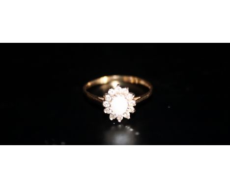 Ladies 9ct Gold Dress Ring Set With A Central Opal Surrounded By 12 Diamonds, Ring Size M, Weight Approx 1.1g