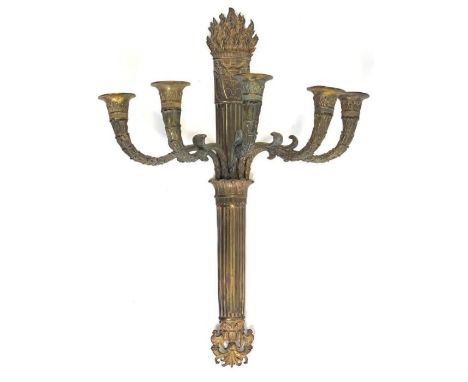 A 19th century gilt metal single wall light, with reeded stem and five candle holders, and flame finial, 58cm high