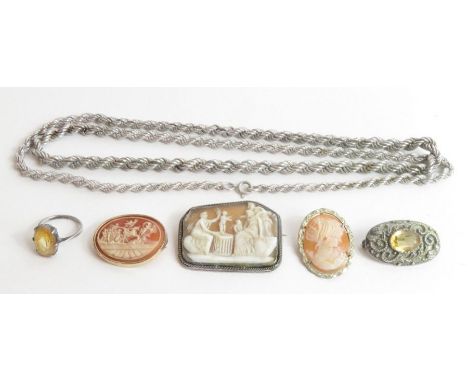 A shell cameo brooch, depicting a classical scene of a person in a chariot chasing a figure, 3cm x 2.3cm, with pendant loop f