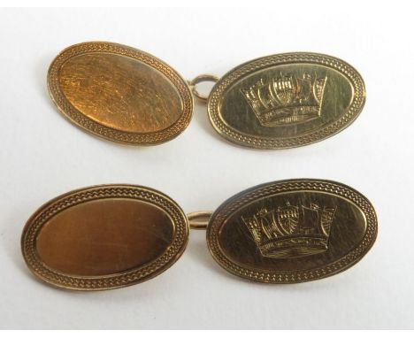 A pair of 9ct gold oval cufflinks, Steele &amp; Dolphin, Chester, 1949, with engine turned borders and one of each decorated 