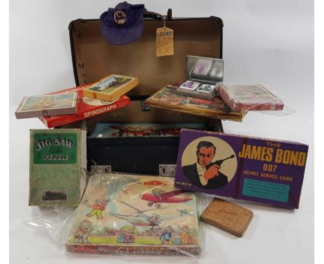 A collection of vintage games and puzzles including James Bond secret service game, G.W.R. puzzle and various others 