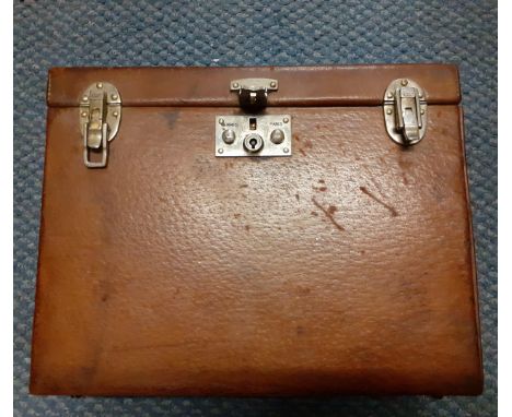 Hermes-A vintage brown leather travelling case 8" high x 10" wide x 4" deep having silver tone hardware with branded name and