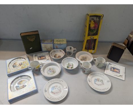 A mixed lot to include Beatrix Potter ceramics to include Wedgwood and others, a Pelham Puppet, 1999 Baby Gift set of UK unci
