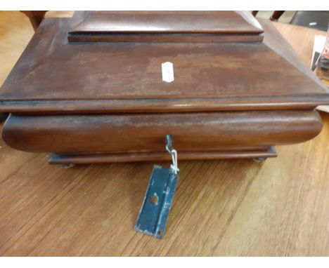 A late 19th century mahogany sarcophagus shaped tea caddy with key, together with a carved gobletLocation: RWM 