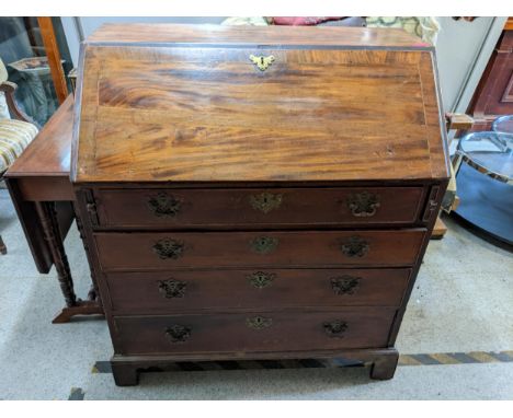 A George III mahogany five drawer bureau, on bracket feet, 104cm h x 95cmwLocation: 