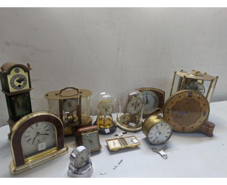 A group of mantel and travel clocks A/F to include Smiths 7 Jewels mantel clock, Anniversary clocks and othersLocation: 