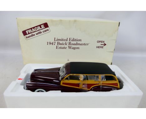 Danbury Mint - A boxed 1/24 scale diecast vehicle, Limited Edition 1947 Buick Roadmaster Estate Wagon with original polystyre
