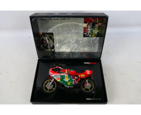 Minichamps - A boxed 1:12 scale Mike Hailwood Ducati 900 Race IOM TT 1978 model # 781212. The bike is a little dusty from dis