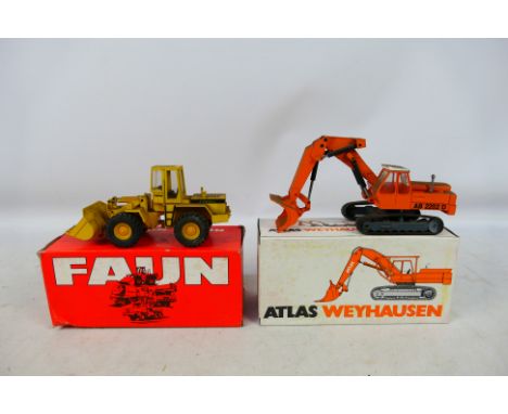 NZG - 2 x boxed models in 1:50 scale, a Faun F2000C Loader # 192 and an Atlas Weyhausen Hydraulic Excavator # 145. They are d
