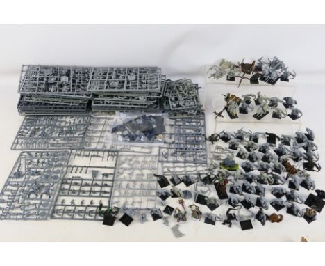 Warhammer - Games Workshop - Over 60 predominately plastic Warhammer figures the vast majority are unpainted, with in excess 
