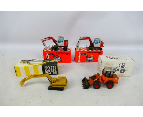 NZG - 4 x boxed 1:50 scale models, a CAT 225 Excavator # 143, Atlas Weyhausen 72C Loader # 320, O&K RH2 Excavator # 288 and O