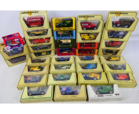 Matchbox - A collection of boxed Yesteryear models including Bugatti T44 # Y-24, Auburn 351 # Y-19, Dusenberg Model J # Y-4 a