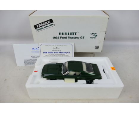 Danbury Mint - A boxed 1/24 scale diecast vehicle Bullitt 1968 Ford Mustang GT with original polystyrene inner. Item appears 
