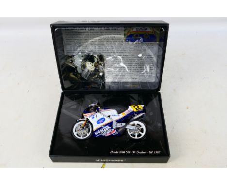 Minichamps - A boxed 1:12 scale Honda NSR 500 W. Gardner GP 1987 model # 870002. The bike is a little dusty from display and 