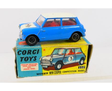 Corgi - A boxed #227 Morris Mini Cooper "Competition Model" Blue, White bonnet and roof, red interior. Item appear over all g