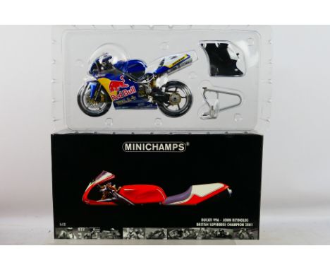 Minichamps - A boxed 1:12 scale Ducati 996 John Reynolds British Superbike Champion 2001 model # 011203. The bike is a little