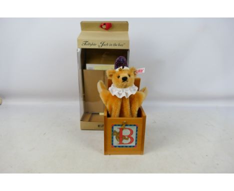 Steiff - A boxed Steiff 'Limited Edition' #037818 'Jack in the Box' 'Teddy Bear. The 23cm bear comes with Steiff button to ea