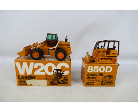 NZG - 2 x boxed models in 1:35 scale, Case W20C Loader # 214 and a Case 850C Angle Dozer # 176. They are dirty from display a