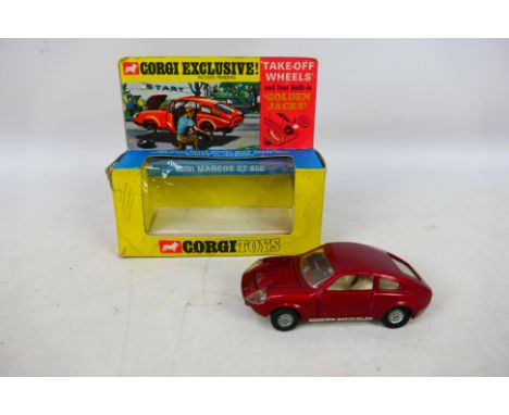Corgi - A boxed Corgi diecast #341 Mini Marcos GT 850 Item appears to be in mostly very good condition with some signs of use