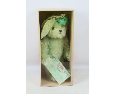 Merrythought - A boxed Limited Edition Merrythought 'Queen Elizabeth The Queen Mother' mohair bear. The 37cm bear in pale gre