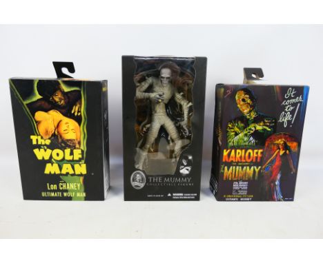 Neca - Mezco - Three boxed action figures, consisting of Mezco #63103 'The Mummy' 9"; with two Neca 'Universal Monster' 7" fi