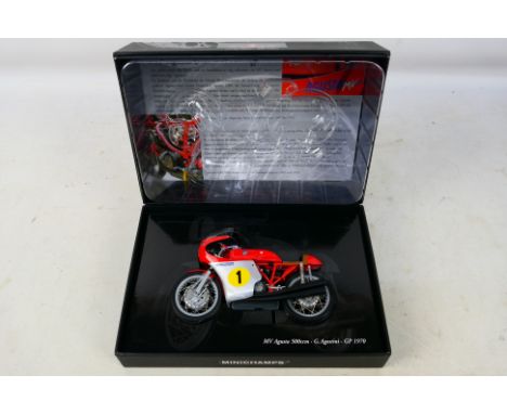 Minichamps - A boxed 1:12 scale MV Augusta 500ccm GP 1970 model # 700001. The bike is a little dusty from display and appears