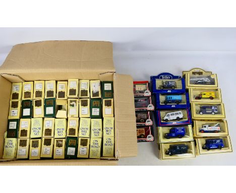 Lledo - A boxed collection of 50 diecast model vehicles from Lledo. Lot includes Lledo #48000 1939 Chevrolet Car; #18016 1936