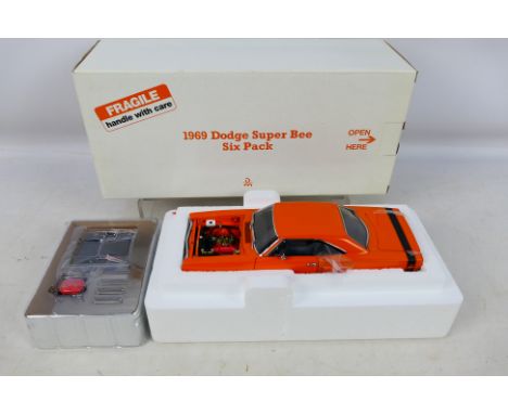Danbury Mint - A boxed 1/24 scale diecast vehicle 1969 Dodge Super Bee Six Pack with original polystyrene inner. Item appears