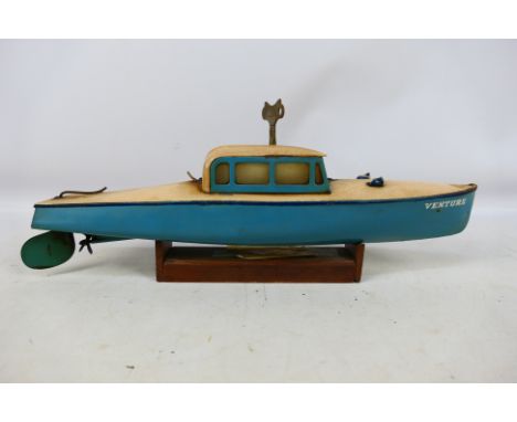 Hornby - An unboxed vintage clockwork tinplate Speed Boat in blue and white with original key. Item shows signs of use and ha