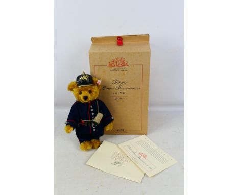 Steiff - A boxed Steiff 'Limited Edition' #655654 'Berlin Fireman Bear'. The 30cm fully jointed character bear comes with Ste
