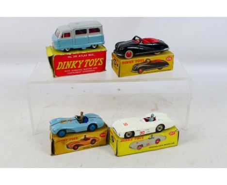 Dinky Toys - 4 diecast items to include #295 AutoBus Atlas, #104 Aton Martin DB3S, Austin Atlantic Convertible and #237 Merce