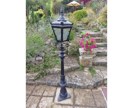 A Pair Of Garden Black Cast And Light Metal Lantern Lamps In The Victorian Style