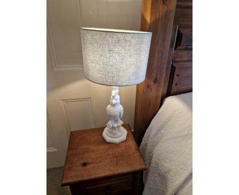 A Pair Of Table Lamps Elegantly Fashioned In White This Table Lamp Features An Intricately Designed Cockatoo Bird Complete Wi