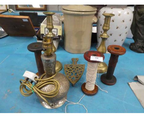 Pair of Brass candle sticks, three Bobbins, Trivets and Brass table lamp base 