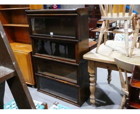 A Globe Wernicke oak four tier Lawyer's Bookcase