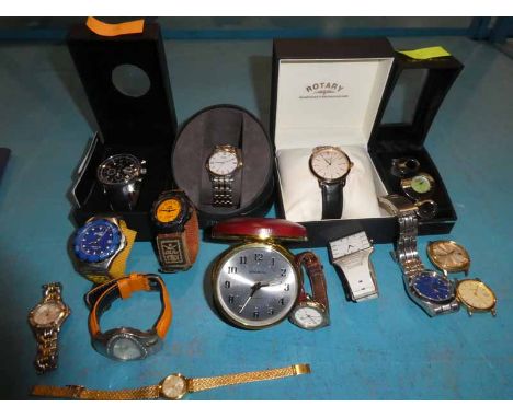 14 Ladies and Gents modern wrist watches and a bedside alarm clock 