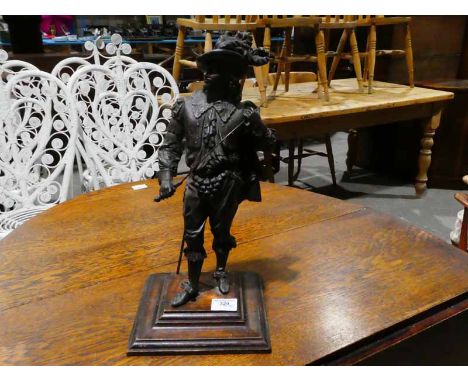 A spelter model as a Cavalier, 44cm tall on wooden plinth