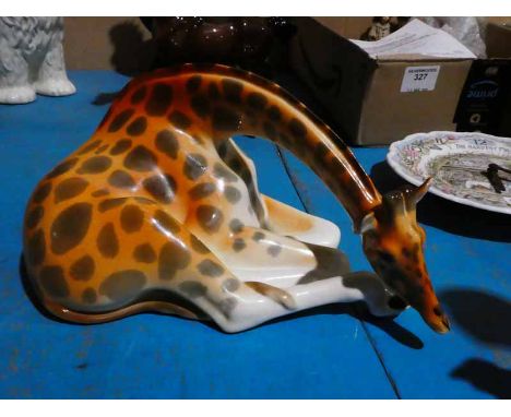 A USSR pottery model of a recumbent Giraffe
