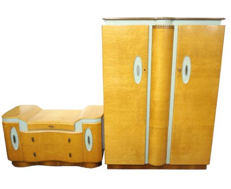 ART DECO BIRDS EYE MAPLE BEAUTILITY ROTA-UNIT WARDROBE
of shaped outline, with a pair of doors having faux shagreen panels to