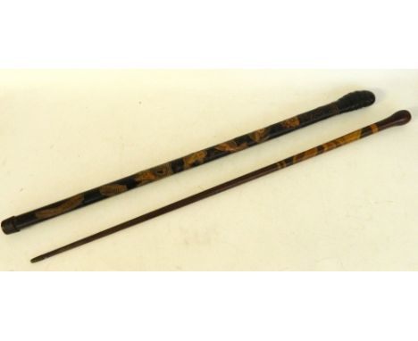VINTAGE JAPANESE BAMBOO WALKING CANE
decorated with carved carp and snake, signed, 90cm long; and a specimen wood walking can